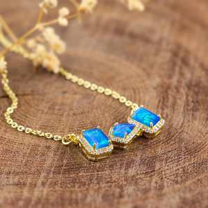 จี้โอปอลไฟสีน้ำเงิน สร้อยคอผู้หญิง โอปอลเอธิโอเปีย หินประจำเดือนตุลาคม สไตล์มินิมอล เงินแท้ 925 ชุบทอง 14K ได้รับการรับรองจาก IGI - Product Image 5