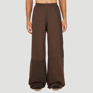 Pantalones de chándal de forro polar marrón de dos tonos con bloques de color, de corte holgado y pierna ancha, con cintura elástica, estilo lounge y casual, para hombre - Product Image 1