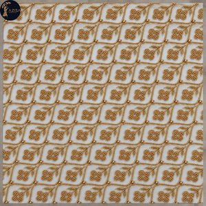Geometric Gold <b>Beaded</b> Dress <b>Fabric</b> with Floral Motifs and Leaf Embroidery | Decorative Textile for Bridal Gowns and Eveningwear - Product Image 1