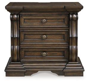 Esta es una mesita de noche Maylee de Ashley Furniture con un acabado en madera marrón oscuro y apliques ornamentales para uso en el dormitorio. - Product Image 6