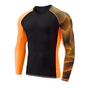 T-shirt de compression personnalisé pour homme à manches longues, noir avec bordure orange, impression par sublimation, séchage rapide, respirant, devant - Product Image 6