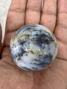Banded aragonite <b>sphere</b> with layered mineral patterns earthy tones polished round form natural texture and distinctive - Product Image 2