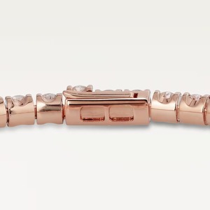 Bracelet tennis rond en or rose de luxe avec diamants pour femme, bijou élégant et minimaliste, idéal pour les soirées chics. - Product Image 3