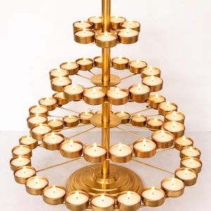 Support de Diya multi-niveaux en métal doré de style bohème JM INTERNATIONAL avec support au sol pour Baby Shower et Diwali - Product Image 1