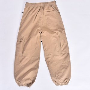Pantalon de neige extérieur beige coupe-vent et doublé polaire avec taille réglable et ourlet élastique pour le ski - Product Image 1