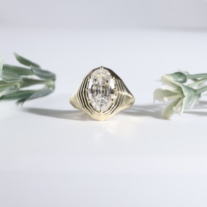 Oval Cut Crystal Diamond Secured By Discrete Prongs Within Heavily Grooved Textured Classic <b>Dome</b> Solitaire Wedding Band Jewelry - Product Image 1