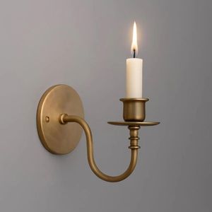 Traditional Wall <b>Sconce</b> combining intricate ornamental craftsmanship with elegant <b>candle</b>-style lighting holders - Product Image 1