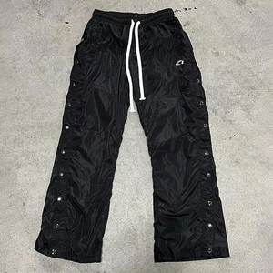 Pantalon de survêtement en nylon pour homme, à ouverture latérale par boutons-pression, léger, taille élastique, style streetwear, fabrication OEM en gros - Product Image 4