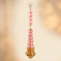 Guirlande suspendue artisanale écologique rose pastel avec pompons et clochettes dorées pour décorations de mariage indien, escalier et entrée