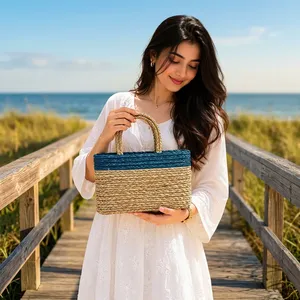 Panier rond moderne en herbe tressée à la main en fibres naturelles, avec poignée décorative, écologique, multi-usages, pour rangement et décoration intérieure, vente en gros - Product Image 1