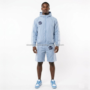 Conjunto Cortavientos de Nylon Ligero para Hombre: Chaqueta y Pantalones Cortos con Capucha - Product Image 1