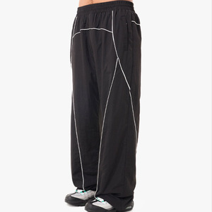 Pantalones jogger de nailon personalizados de pierna ancha, pantalones jogger cortavientos bordados para mujer, pantalones jogger casuales de poliéster y nailon - Product Image 1