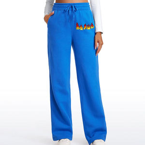 Pantalon de survêtement bleu à jambes larges avec logo personnalisé, taille haute, coupe ample, longueur intégrale, en molleton tricoté décontracté avec imprimé logo flamme - Product Image 1