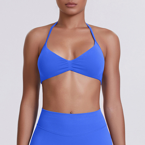 Top sin costuras inalámbrico con cuello halter y triángulo en la espalda, color azul liso para mujer - Product Image 1