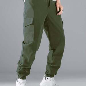 Custom Logo Men's Heavy Duty <b>Cargo</b> <b>Pants</b> Multi-Pocket Knee Pad Construction Sweatpants <b>Waterproof</b> Cheap Worker Trousers - Product Image 1