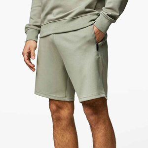 Shorts de sport pour hommes, 5 pouces, logo personnalisé, couleur unie, taille oversize, vêtements de sport pour hommes, fabriqués au Pakistan, service OEM. - Product Image 1