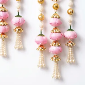 Élégantes boucles d'oreilles pendantes en forme de fleur de lotus rose avec perles et embellissements dorés pour les mariages indiens festifs et traditionnels - Product Image 6