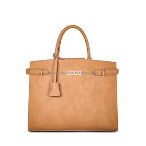 กระเป๋าถือหนังแท้ทำมือสไตล์วินเทจ สีพื้นเรียบหรู พร้อมสายสะพายไหล่ ดีไซน์คลาสสิก พกพาสะดวก ปิดด้วยซิปโลหะ รับสกรีนโลโก้ - Product Image 3