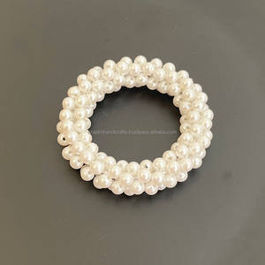 Les ronds de serviette en bambou écologiques apportent une simplicité et un charme naturels à votre table pour les repas quotidiens et les occasions spéciales. - Product Image 1