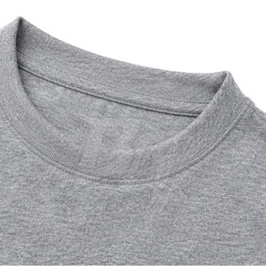 Camisetas deportivas extragrandes para hombre, personalizadas con impresión, fabricadas con tela de poliéster para gimnasio, entrenamiento y running. - Product Image 3
