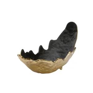 Handmade Stainless Steel Fruit Bowl with Premium Mirror Polish Luxury Decorative SurfaceHandmade Irregular Ceramic Porcelain - Product Image 1