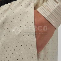 Shorts de sport en maille coupe-vent doux au toucher, contrôle de l'humidité, taille mi-haute élastique, 100 % polyester, design uni décontracté, service OEM de haute qualité