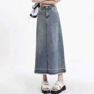 Falda vaquera fina de verano para mujer, estilo chic con borde sin rematar, retro azul, de longitud media, de cintura alta, de color liso, a la moda - Product Image 1