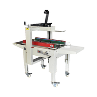 Scellant de petites boîtes Bropac FXJ4030X, machine à sceller les boîtes en carton.