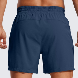 Shorts décontractés pour hommes, bleu marine uni, tricotés, avec logo frontal, séchage rapide, poches, taille mi-haute et cordon de serrage, style sport - Product Image 5