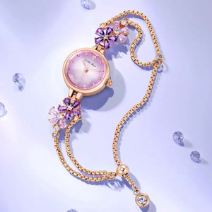 Nouvelle montre unisexe en alliage à quartz, bracelet en plastique, verre léger, motif floral, pour femmes, vente en gros d'usine 2026 - Product Image 3