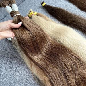 Couleur brune en gros chaude de qualité supérieure cheveux vierges vietnamiens ondulés droits doublement étirés couleur foncée - Product Image 1