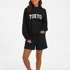 Ensemble haut à col montant et short pour femme, offrant une polyvalence de style grâce à une tenue moderne en deux pièces - Product Image 1