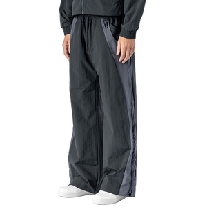 Pantalon de jogging ample pour homme personnalisé, coupe droite, en nylon coupe-vent, anti-plis, de haute qualité, avec cordon de serrage élastique, pour le sport - Product Image 1