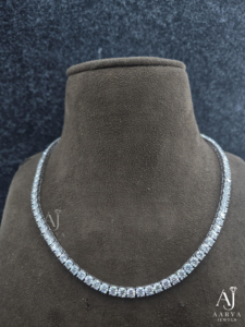 Collier tennis AARVA en moissanite, taille brillant rond, serti en canal, argent 925 plaqué rhodium, style classique pour femme - Product Image 1