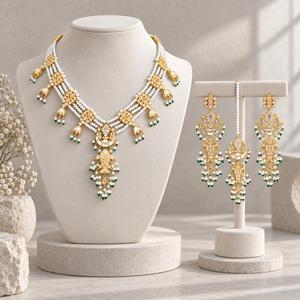 <b>Gold</b> Plated Layered Faux Pearl Necklace Earrings and Maang Tikka <b>Set</b> with Green Beads Bridal Jewelry Factory Wholesale - Product Image 1