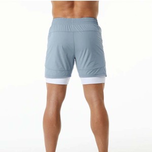 Men's Light Blue Quick Dry Sport Shorts With Pockets Elastic Waist <b>Mid</b> Length Solid Color Knitted Polyester - Product Image 2