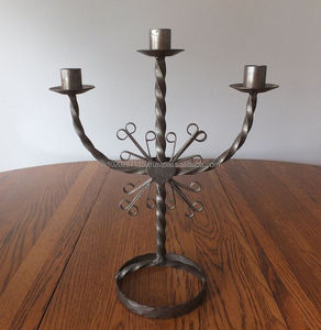 Elegant <b>black</b> iron <b>candelabra</b> handcrafted with scroll arms for use in historic homes wedding setups or garden parties - Product Image 6