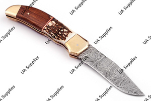 มีดพับเหล็กดามัสกัสทำมือคุณภาพสูงสำหรับมืออาชีพ ด้ามจับทำจากเขาสัตว์ กวาง ไม้พะยูง และทองเหลือง เหมาะสำหรับการล่าสัตว์ กิจกรรมกลางแจ้ง ตั้งแคมป์ พกพาสะดวก (EDC) รับผลิตแบบ OEM - Product Image 3