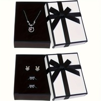 Ensemble d'emballage de luxe pour bijoux avec logo personnalisé, boîte rigide en carton et sac avec poignée en ruban noir pour marque, vente en gros