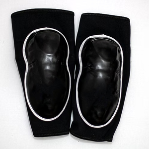 Genouillères rembourrées robustes, couleur contrastée noir et blanc, pour le sport et l'entraînement, MMA, Muay Thai, protection et confort. - Product Image 3