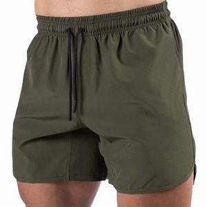 Shorts pour hommes à couleur unie, séchage rapide, avec cordon de serrage, taille mi-haute, décontractés, pour la gym et l'entraînement, en tissu polyester, avec poches - Product Image 5