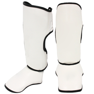Protège-tibias de boxe en cuir PU les plus vendus – Protection complète de haute qualité, logo et couleur personnalisables, protège-pieds d'entraînement MMA - Product Image 1