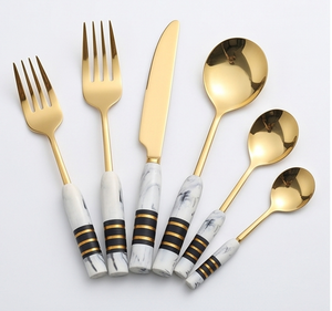 Ensemble de couverts en acier inoxydable doré exquis avec manche en marbre, parfait pour les dîners de mariage et les occasions spéciales. - Product Image 1