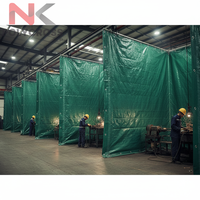 Rideau de séparation transparent et imperméable pour ateliers et zones de production, idéal pour l'aménagement industriel