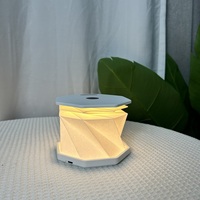Produk baru 2025 lampu kertas lipat kreatif lampu malam ABS lampu LED isi ulang tipe-c hadiah bisnis praktis promosi