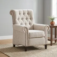 Fauteuil à bascule de luxe moderne en tissu tufté beige avec accoudoirs roulés, garniture cloutée et dossier haut pour salon, chambre ou bureau