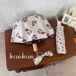 Paraguas Negro de Doble Uso para Mujer con Protección UV, Diseño de Fruta de Espino, Sombrilla Plegable Pequeña y Fresca para Sol y Lluvia - Product Image 1