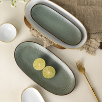 YAYU OEM ODM Assiettes ovales en porcelaine vert foncé, vaisselle à gâteau de fruits blanc moucheté, assiette à dessert en céramique pour restaurant thaïlandais