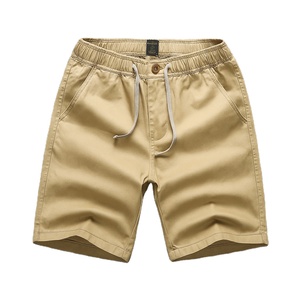Vente en gros de shorts chino solides pour hommes, short d'été respirant à taille élastique et à fermeture éclair, short en coton à séchage rapide écologique, personnalisé - Product Image 1