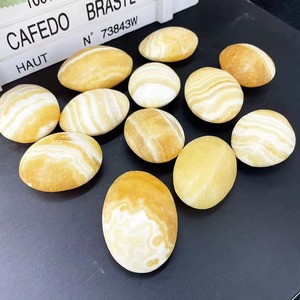 หินแคลไซต์สีเหลืองส้มธรรมชาติขัดเงาสำหรับตกแต่ง ขายส่ง - Product Image 1